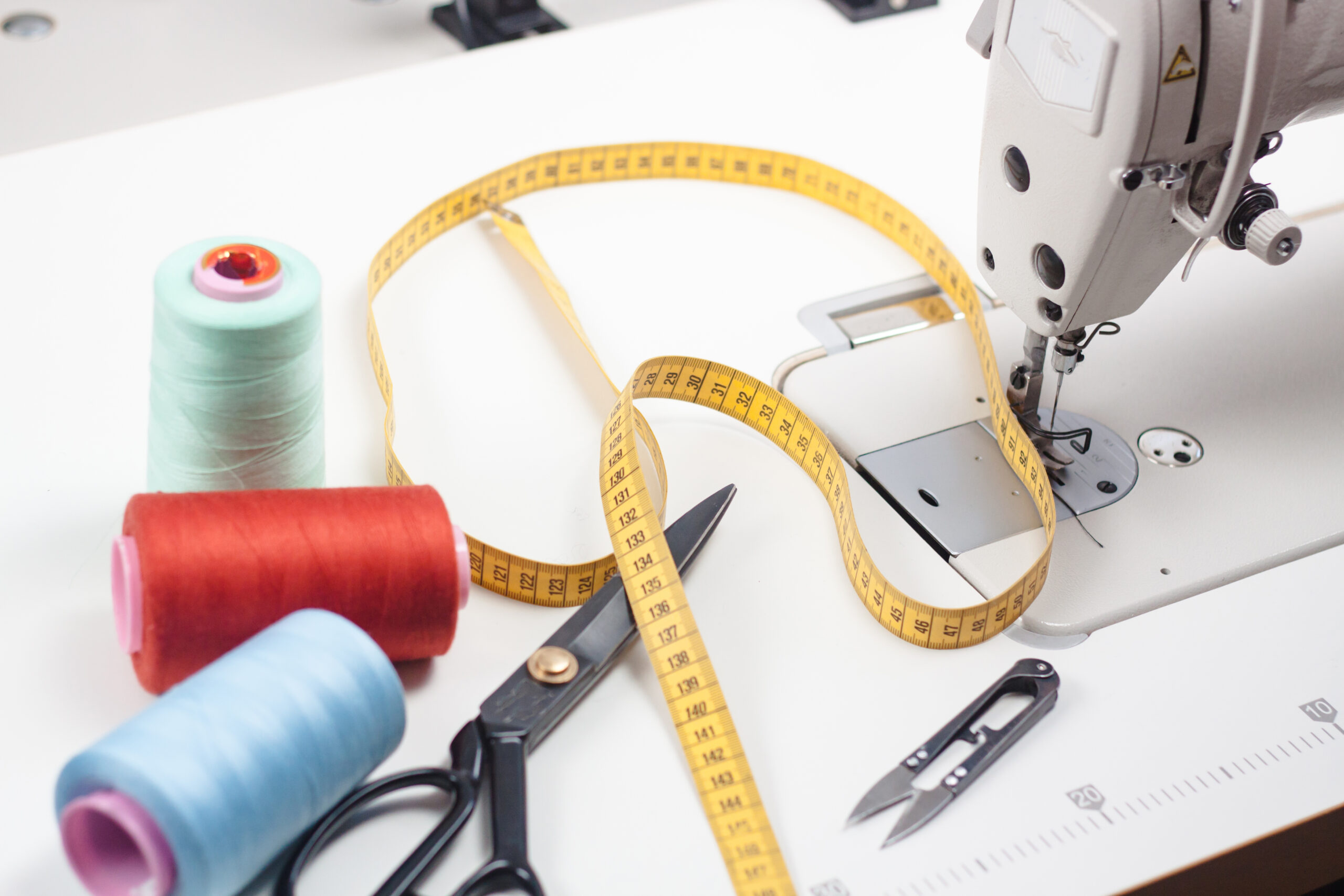 vecteezy_picture-of-seamstress-workshop-and-tools_7136585